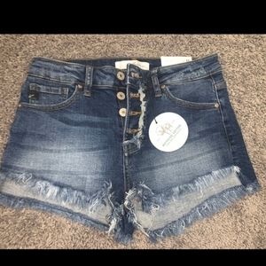 Brand new KanCan size medium shorts with 4 button fly.